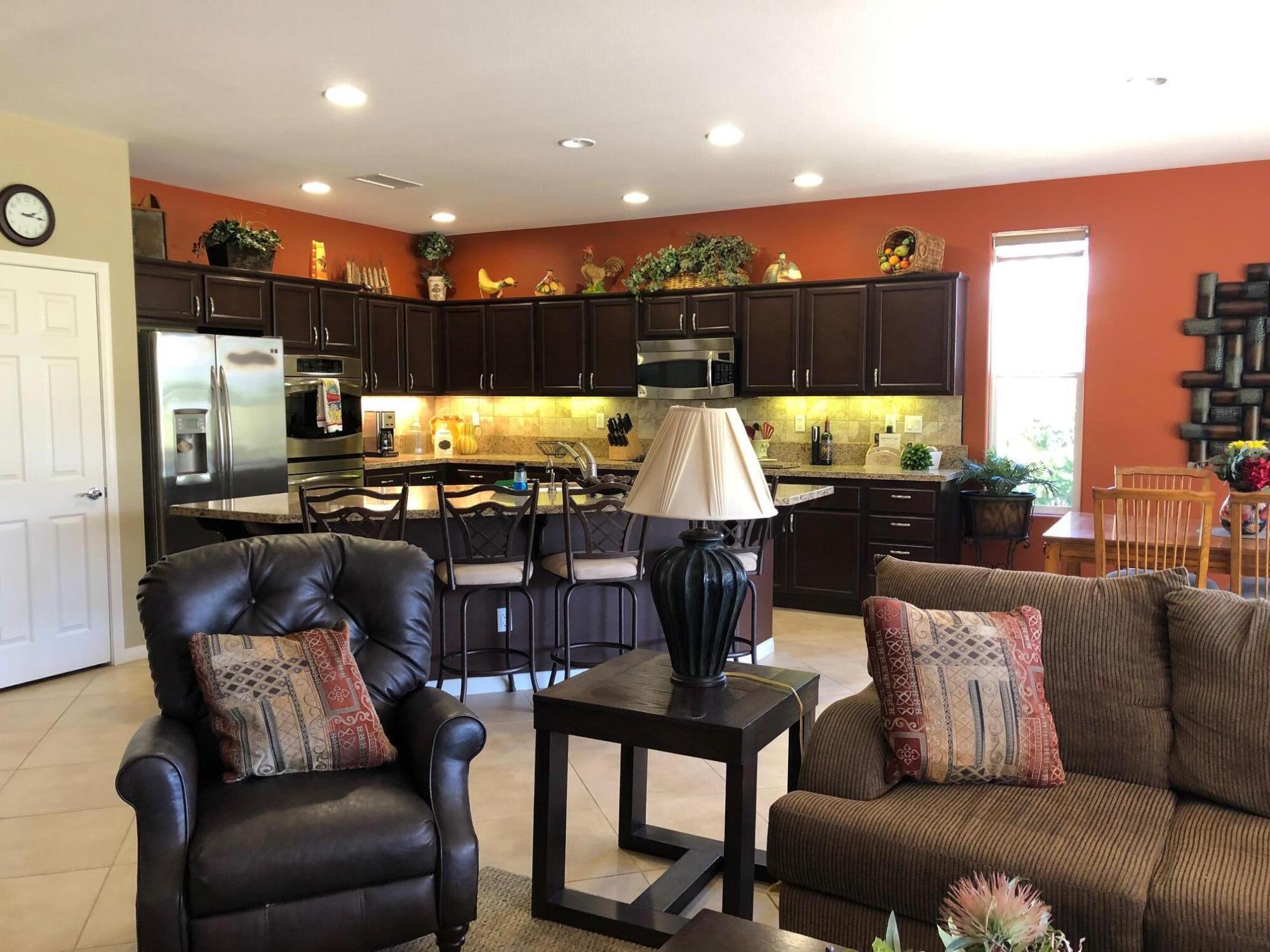 81565 Rustic Canyon Drive La Quinta, CA 92253 - Photo 5 of 12 a living room with furniture kitchen and a view
