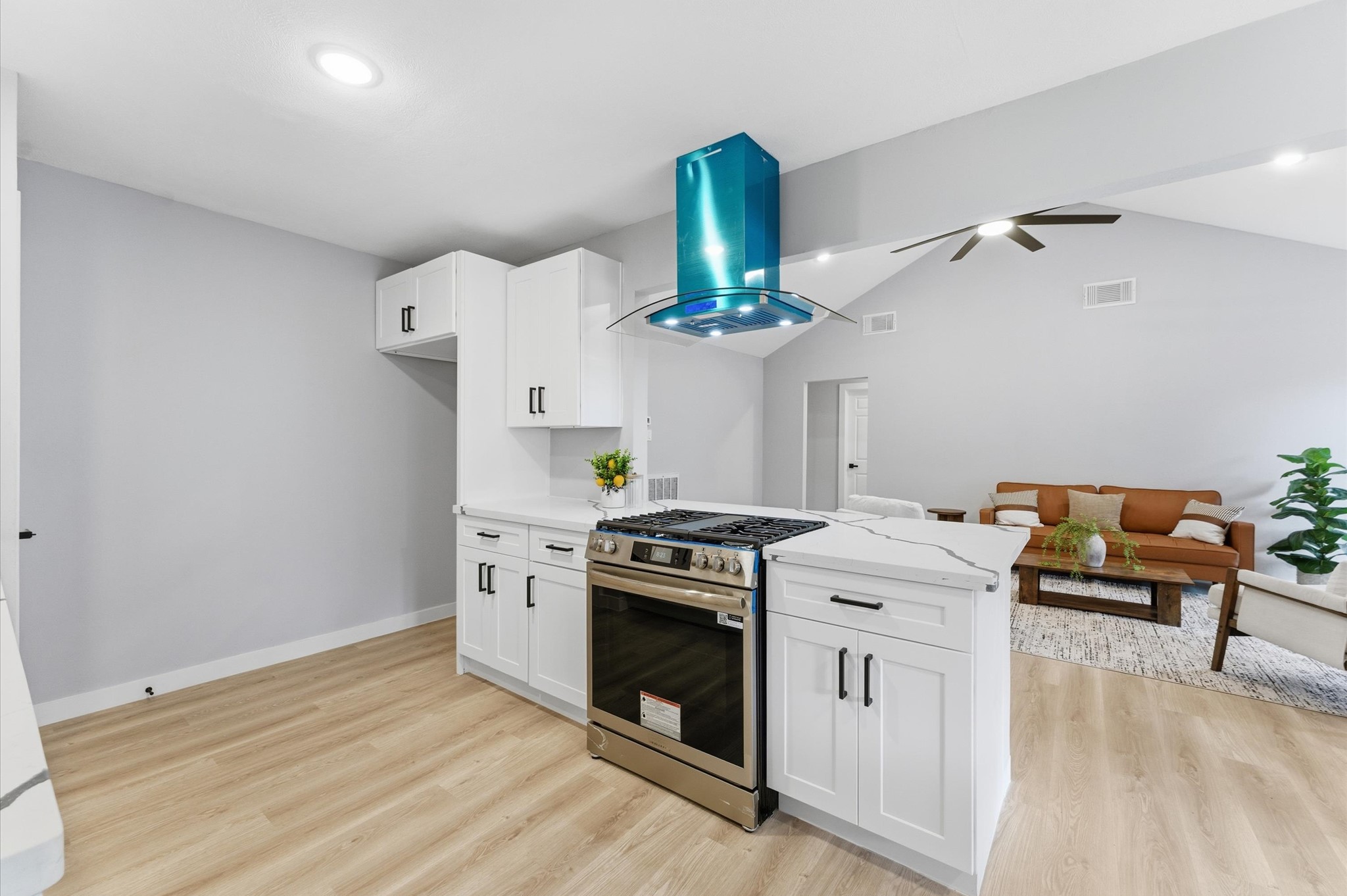 30 North Drifting Leaf Court Spring, TX 77380 - Photo 18 of 42 Luxury glass, stainless steel range hood installed