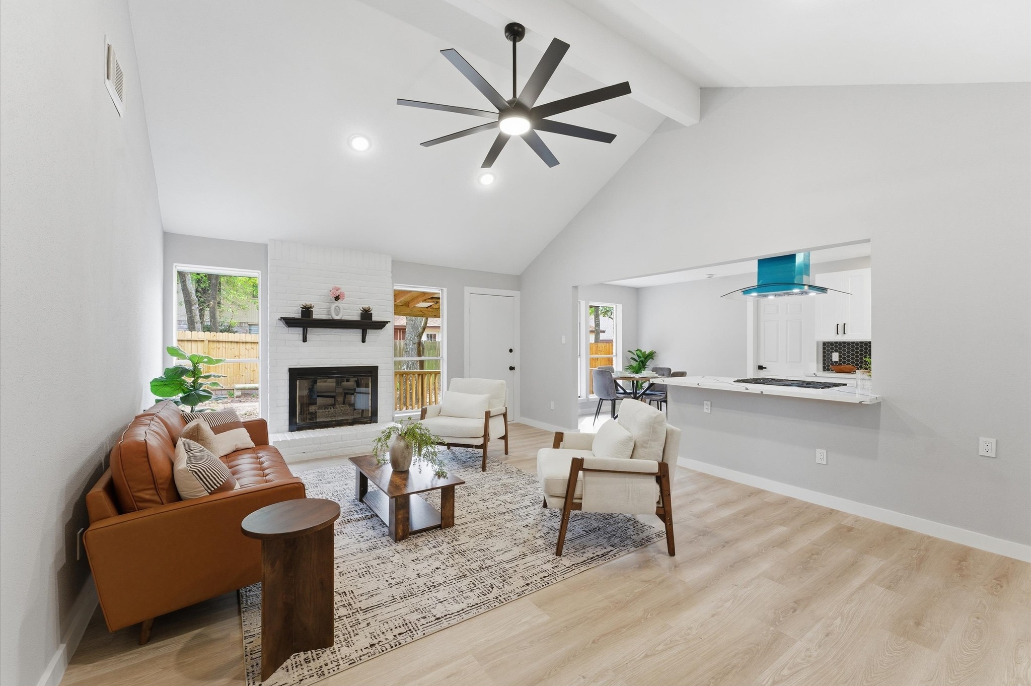 30 North Drifting Leaf Court Spring, TX 77380 - Photo 7 of 42 Staged living area. Gas chimney