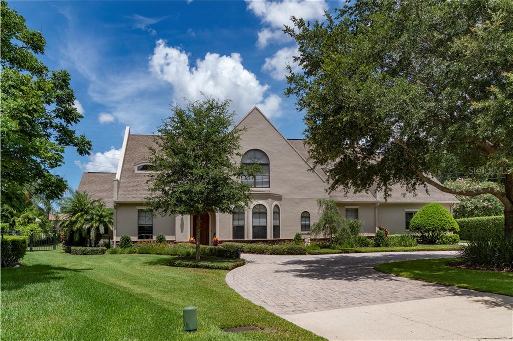 Front of home with circle driveway