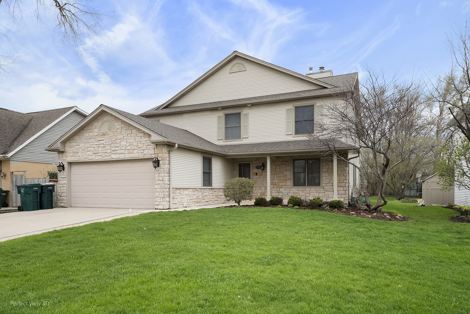 3070 Koepke Road Northbrook, IL 60062 - Photo 1 of 27 a front view of a house with a yard and garage