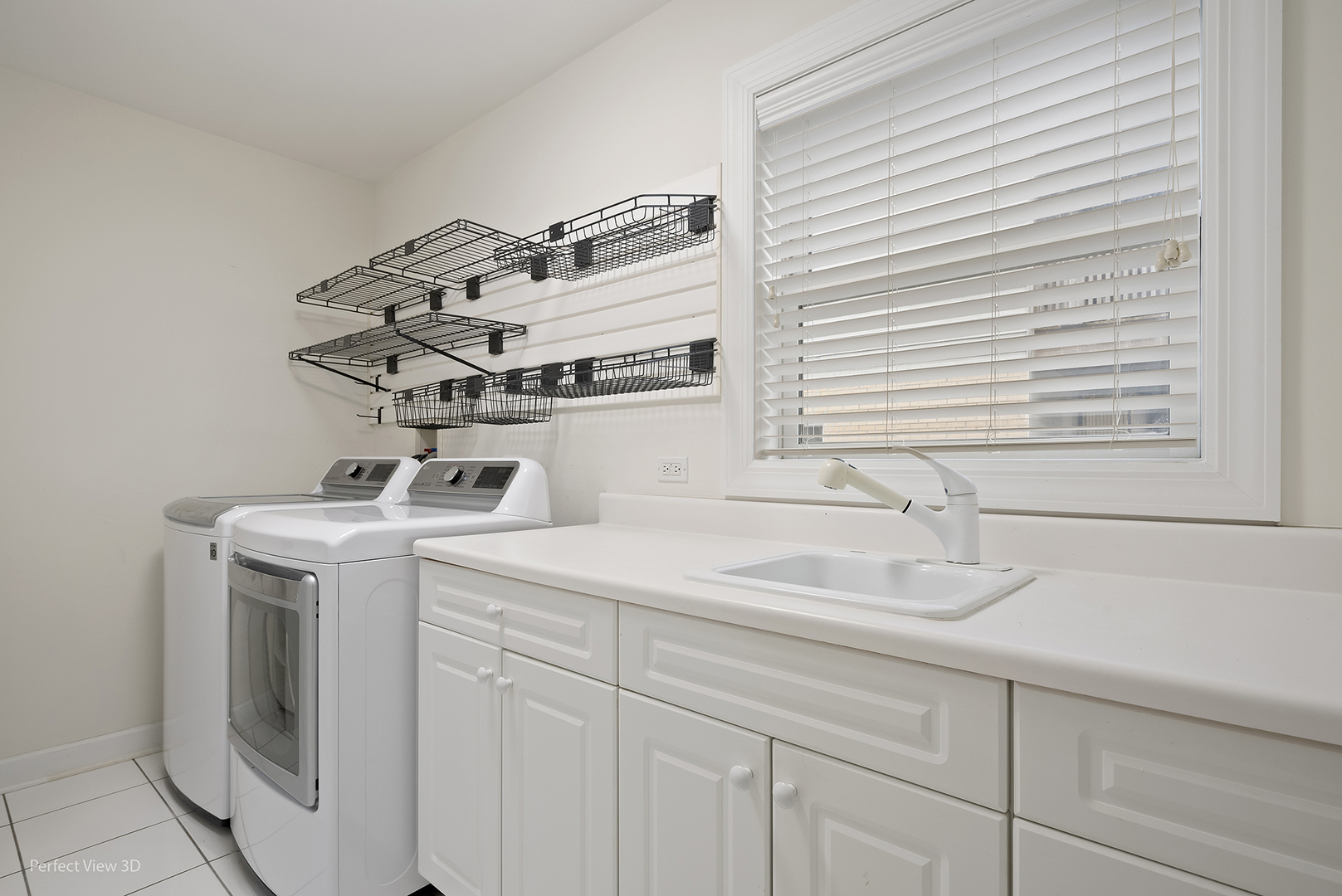 3070 Koepke Road Northbrook, IL 60062 - Photo 6 of 27 a utility room with sink dryer and washer