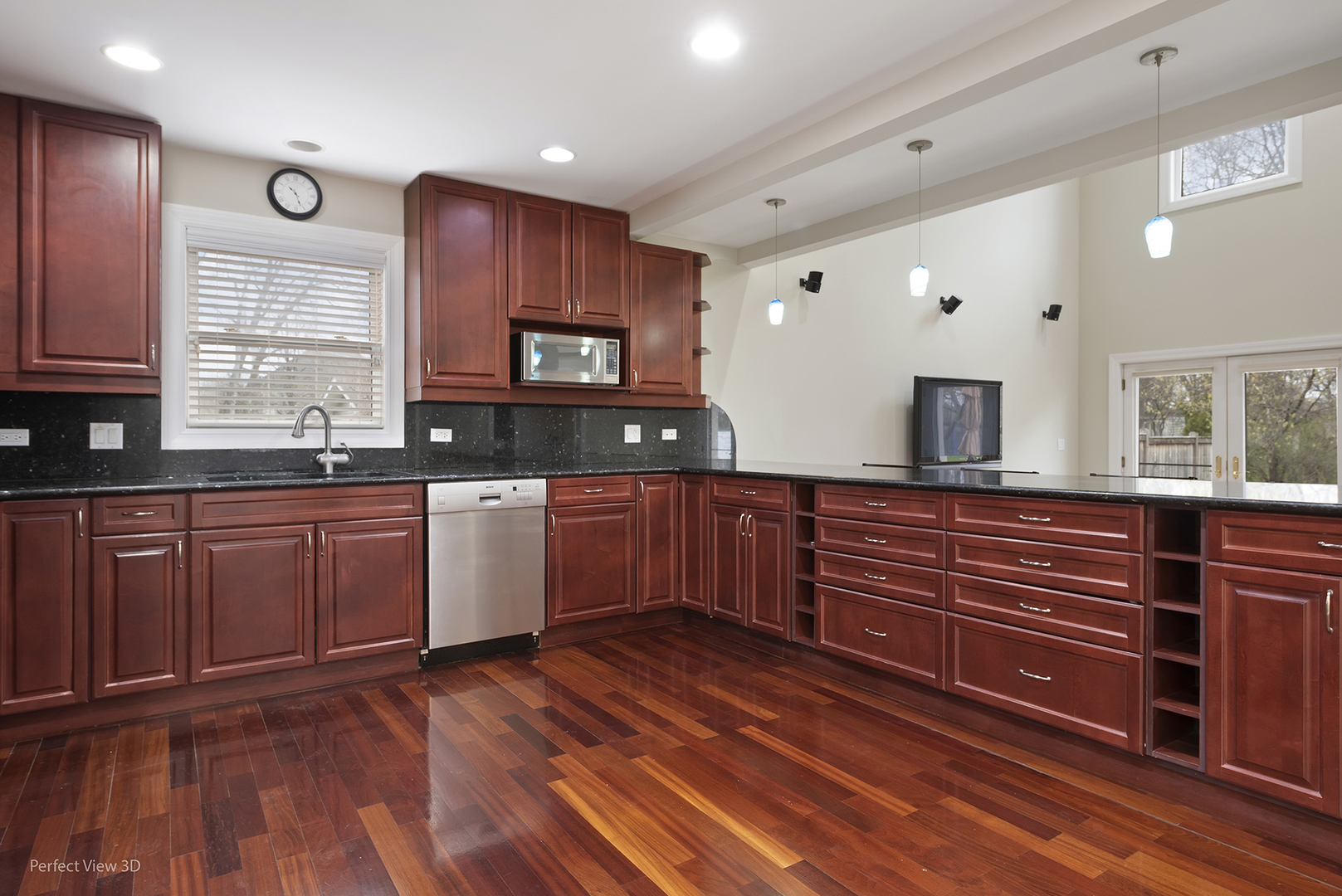 3070 Koepke Road Northbrook, IL 60062 - Photo 9 of 27 a large kitchen with wooden floors and stainless steel appliances