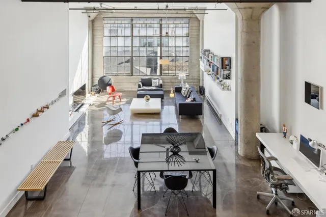 a workspace with furniture and a window