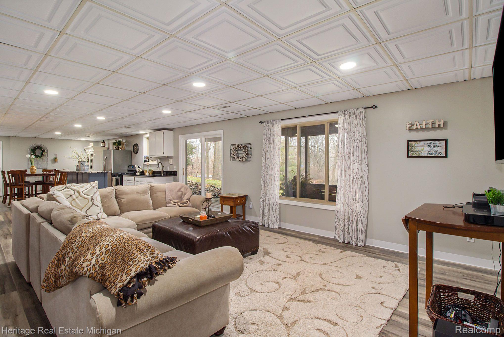 16505 South Seymour Road Linden, MI 48451 - Photo 22 of 33 Downstairs family room is where everyone relaxes!