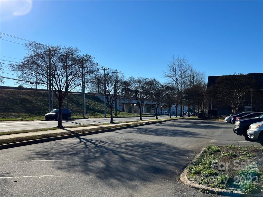 6300 Old Pineville Road Charlotte, NC 28217 - Photo 2 of 4 a view of a street with a building and a fire hydrant
