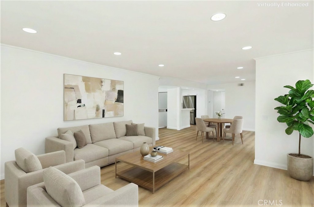 94 Greenfield Irvine, CA 92614 - Photo 1 of 1 a living room with furniture and a potted plant