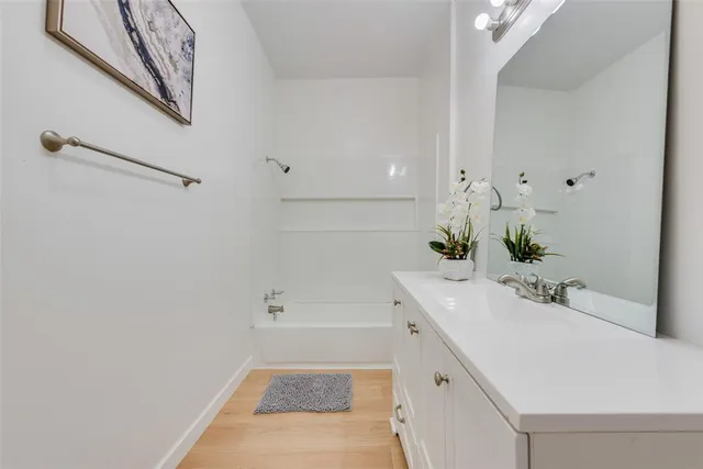 a bathroom with a sink and a bathtub