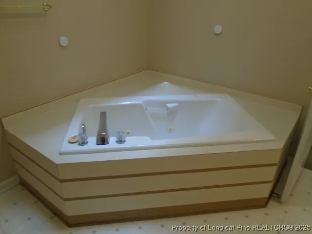 a bathroom with a shower and a toilet