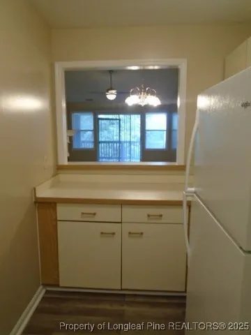 a bathroom with a sink and a window