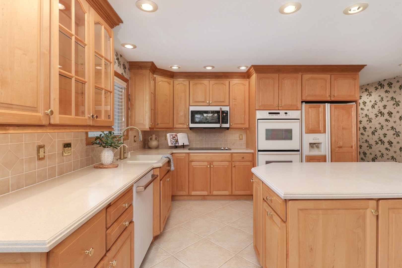10 Kent Drive Normal, IL 61761 - Photo 11 of 73 a kitchen with a sink a microwave a stove and refrigerator