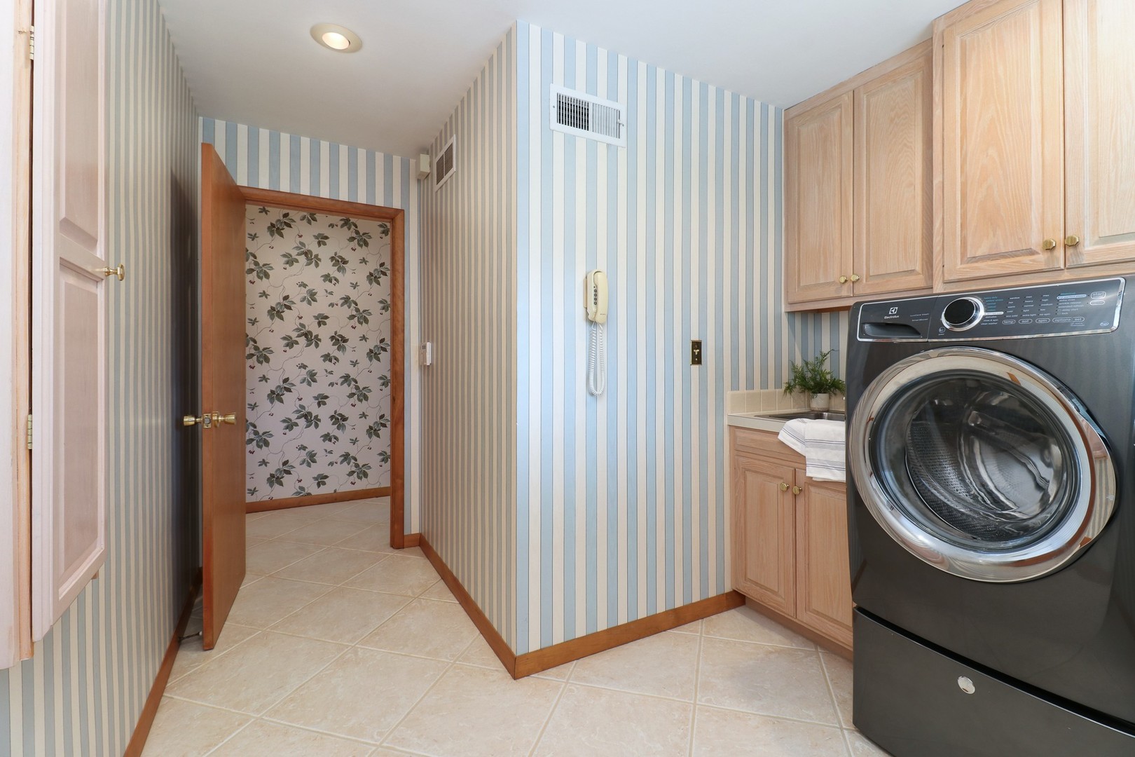 10 Kent Drive Normal, IL 61761 - Photo 13 of 73 a view of a storage & utility room with washer and dryer