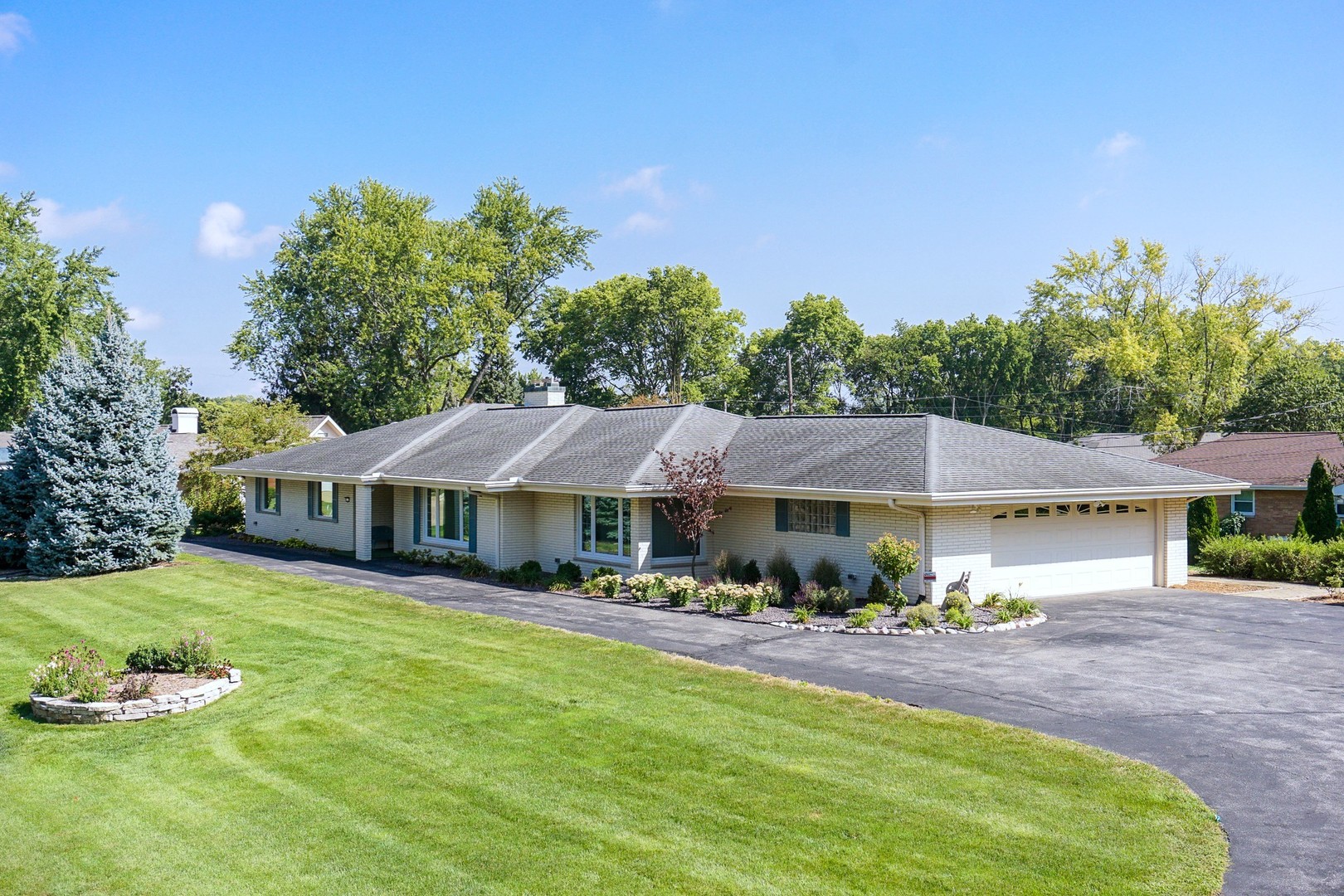 10 Kent Drive Normal, IL 61761 - Photo 2 of 73 a front view of a house with garden
