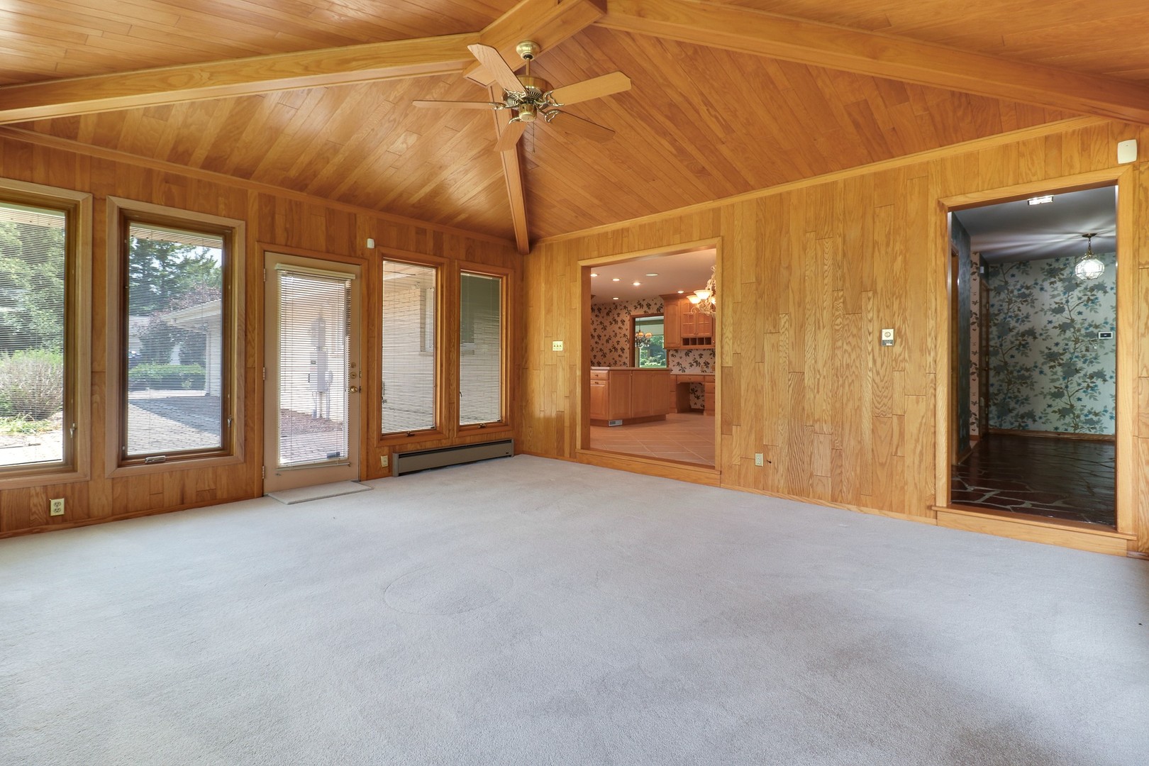 10 Kent Drive Normal, IL 61761 - Photo 24 of 73 a view of a room with sliding door and a ceiling fan