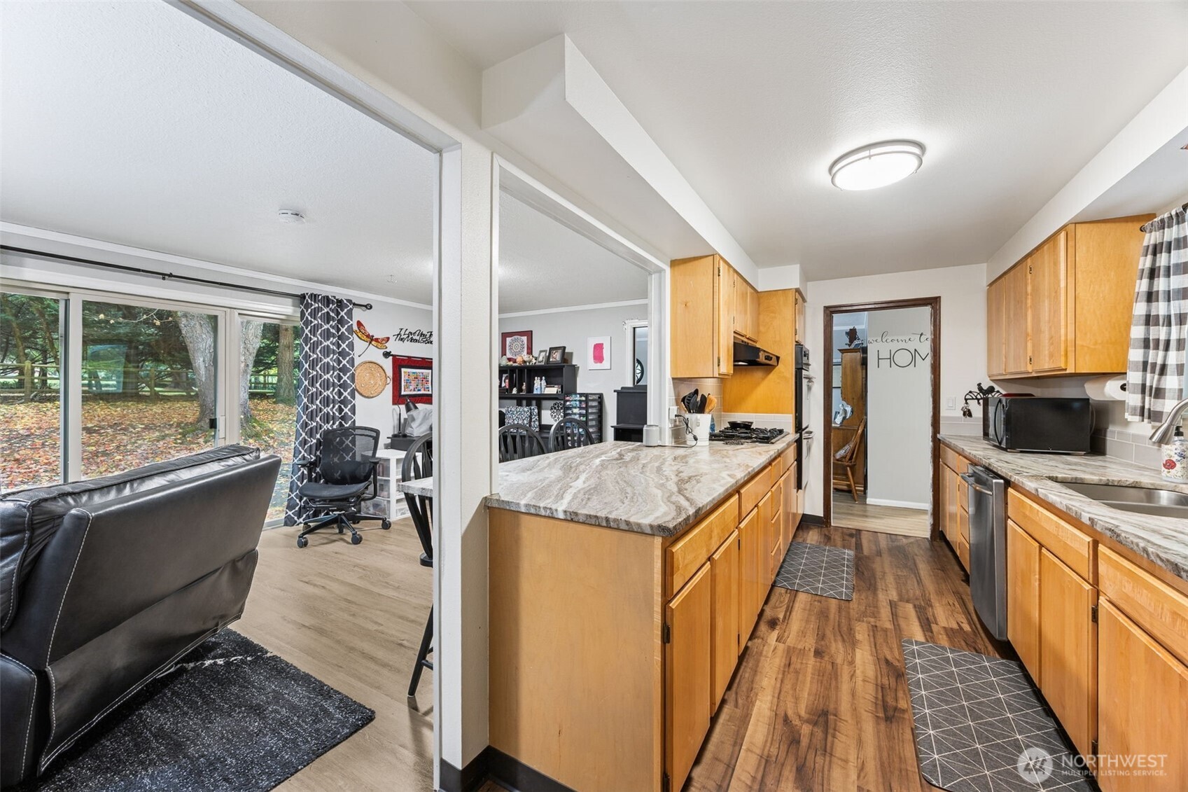 5700 Cooper Point Road Northwest Olympia, WA 98502 - Photo 11 of 31 a kitchen with granite countertop lots of counter top space