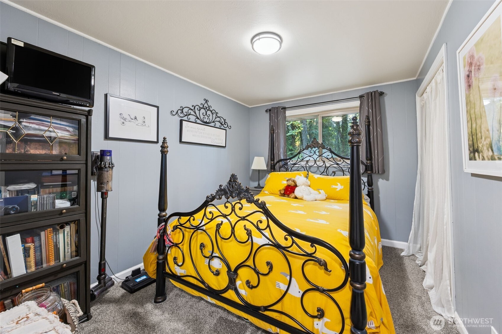 5700 Cooper Point Road Northwest Olympia, WA 98502 - Photo 23 of 31 a view of a living room and bathroom