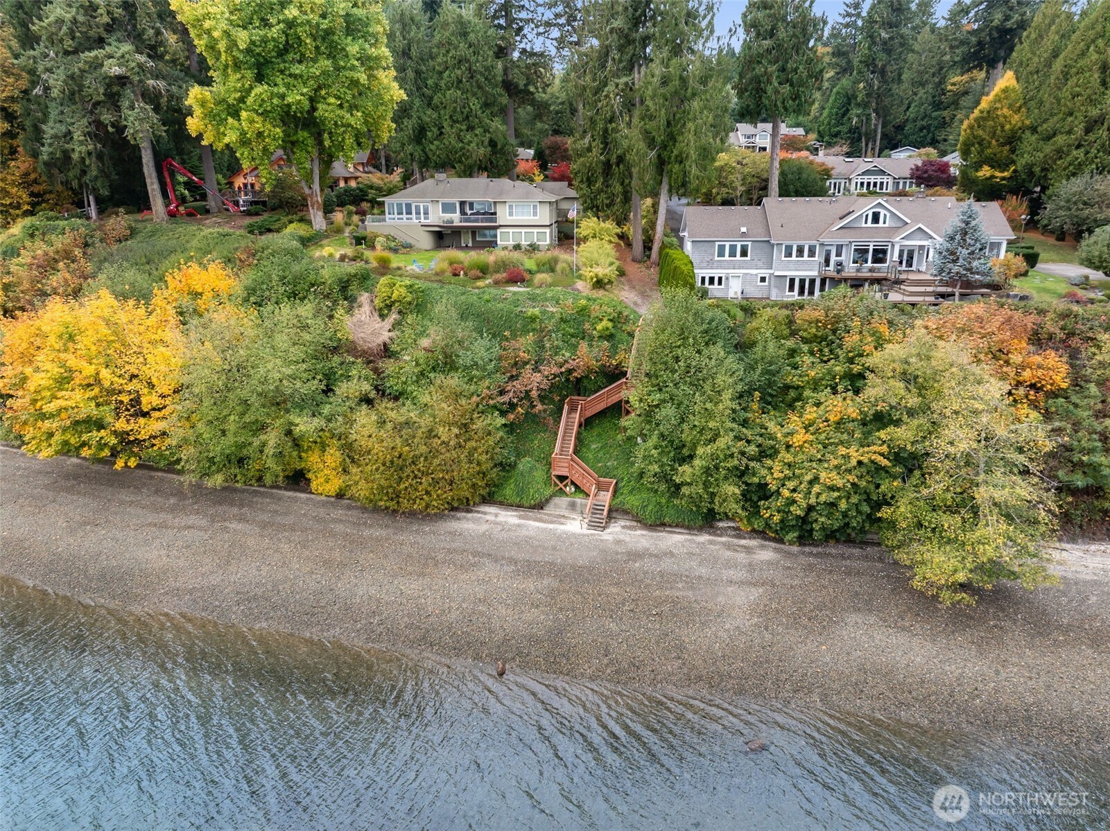 5700 Cooper Point Road Northwest Olympia, WA 98502 - Photo 30 of 31 a backyard of a house with lots of green space