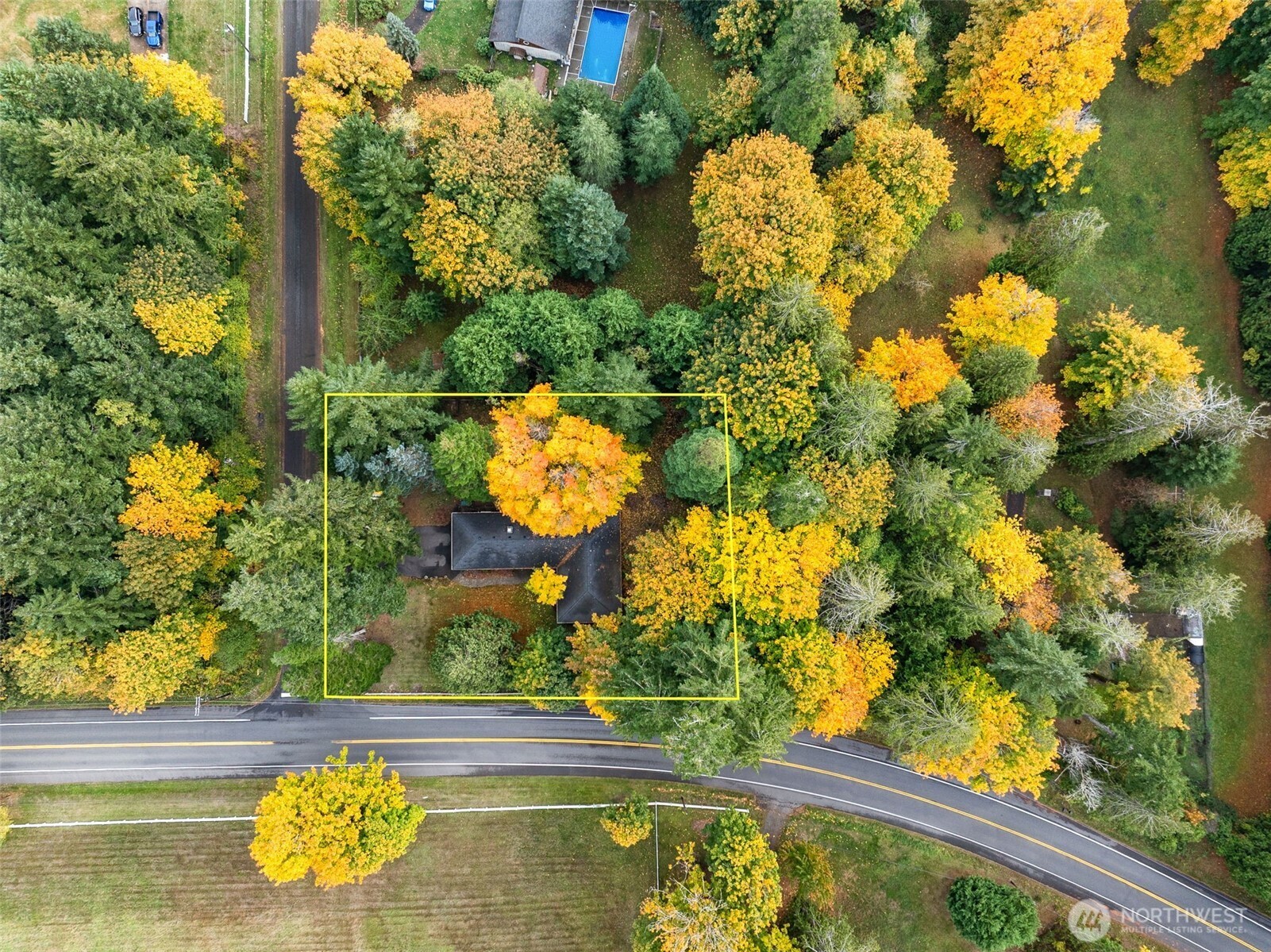 5700 Cooper Point Road Northwest Olympia, WA 98502 - Photo 4 of 31 a view of swimming pool with a garden