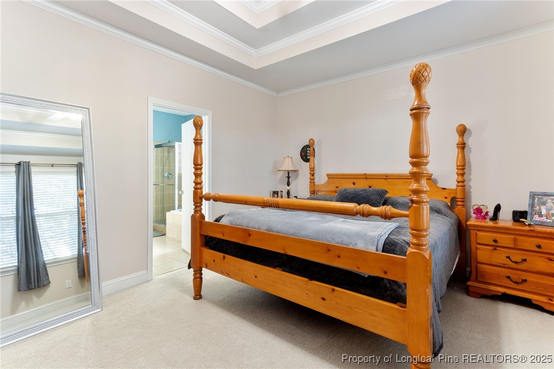58 Cottswold Lane Spring Lake, NC 28390 - Photo 16 of 47 a bedroom with bed and window