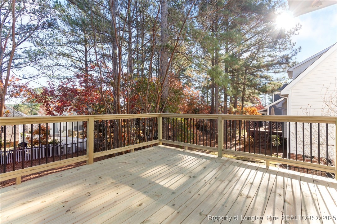 58 Cottswold Lane Spring Lake, NC 28390 - Photo 30 of 47 a view of balcony with wooden floor and fence