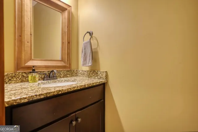 a bedroom with a bed and closet