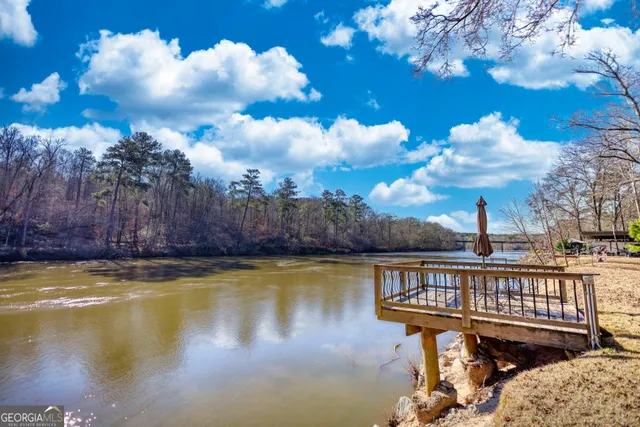 a view of balcony with wooden floor