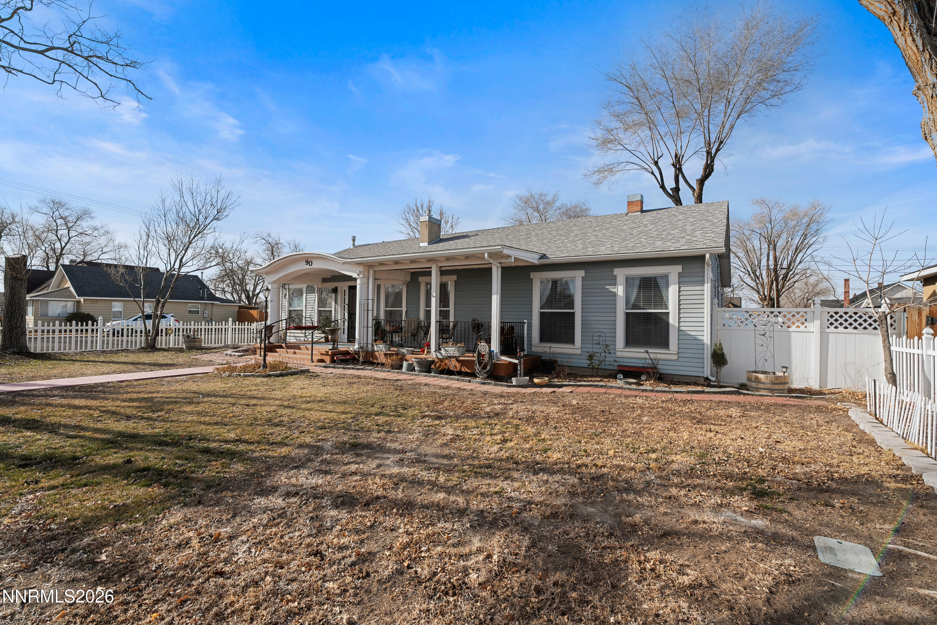 90 South Allen Street Fallon, NV 89406 - Photo 3 of 41 a front view of a house with a yard tree and outdoor seating
