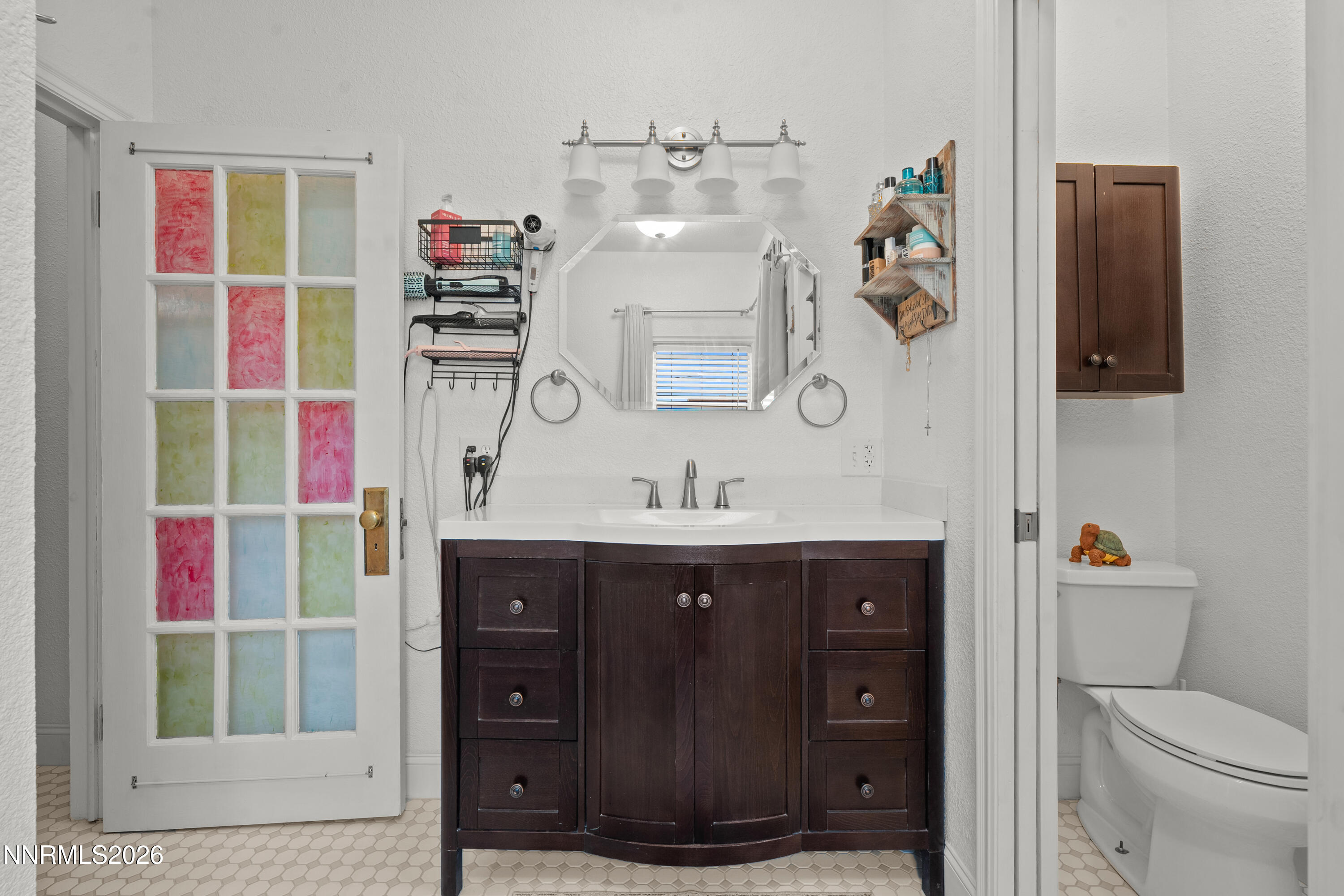 90 South Allen Street Fallon, NV 89406 - Photo 31 of 41 a bathroom with a sink vanity and toilet