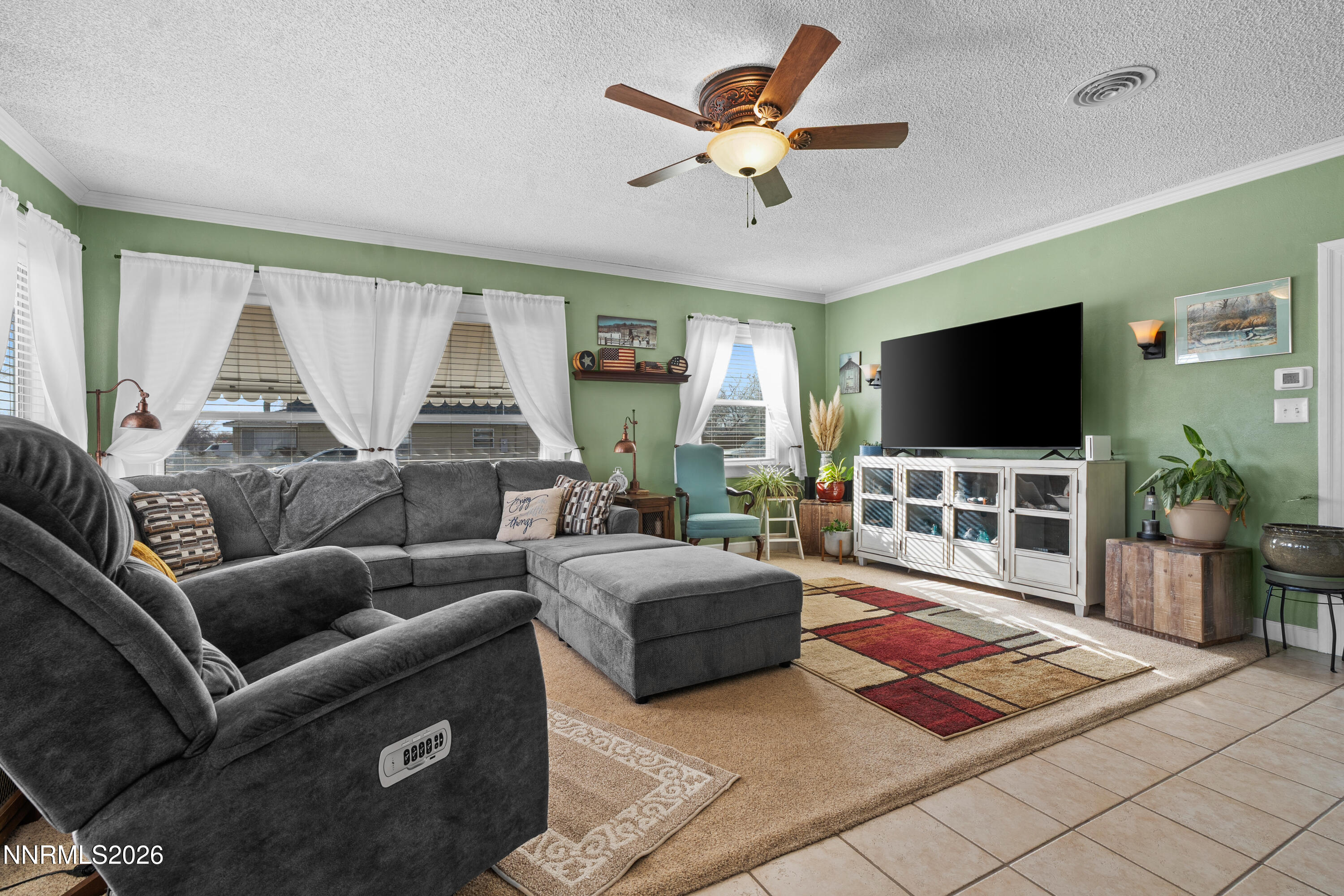 90 South Allen Street Fallon, NV 89406 - Photo 6 of 41 a living room with furniture and a flat screen tv