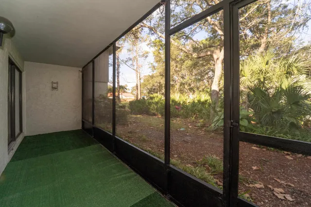 a view of a porch with a yard