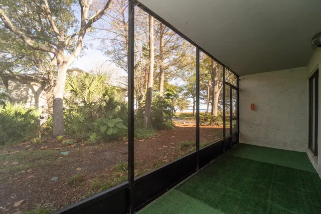 a view of a porch with a yard