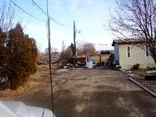 701 Maple Grove Road Sunnyside, WA 98944 - Photo 3 of 7 a view of a street with cars