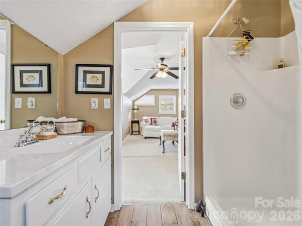 a view of bathroom with dual sinks