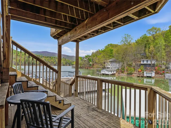 a dining room with a table and chairs