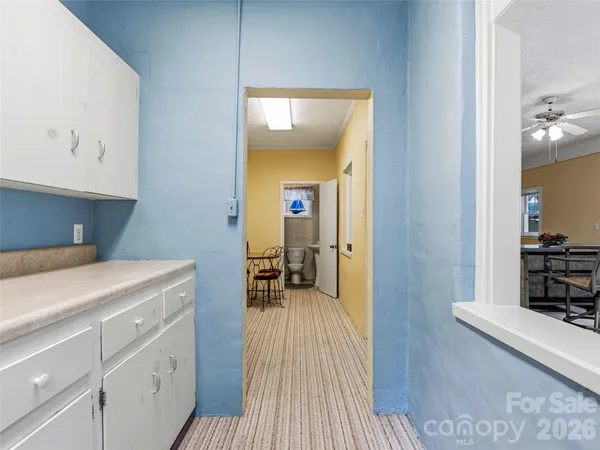a bathroom with a toilet and a sink