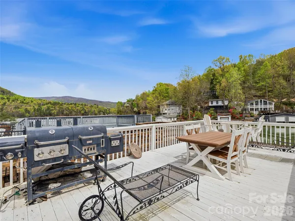 a street view with wooden fence and plants