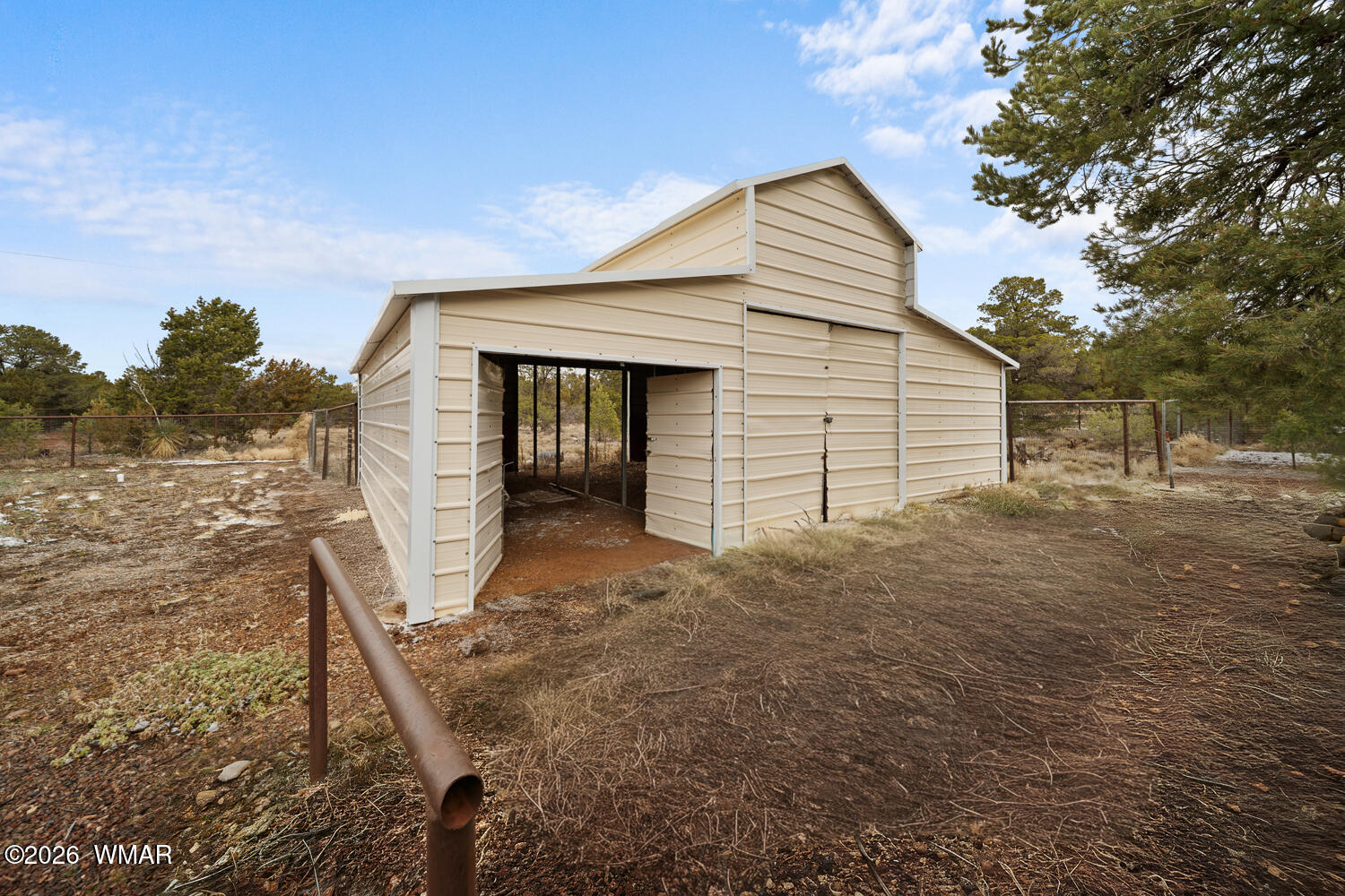 9 N3307 Show Low, AZ 85901 - Photo 14 of 50 a front view of a house with a yard