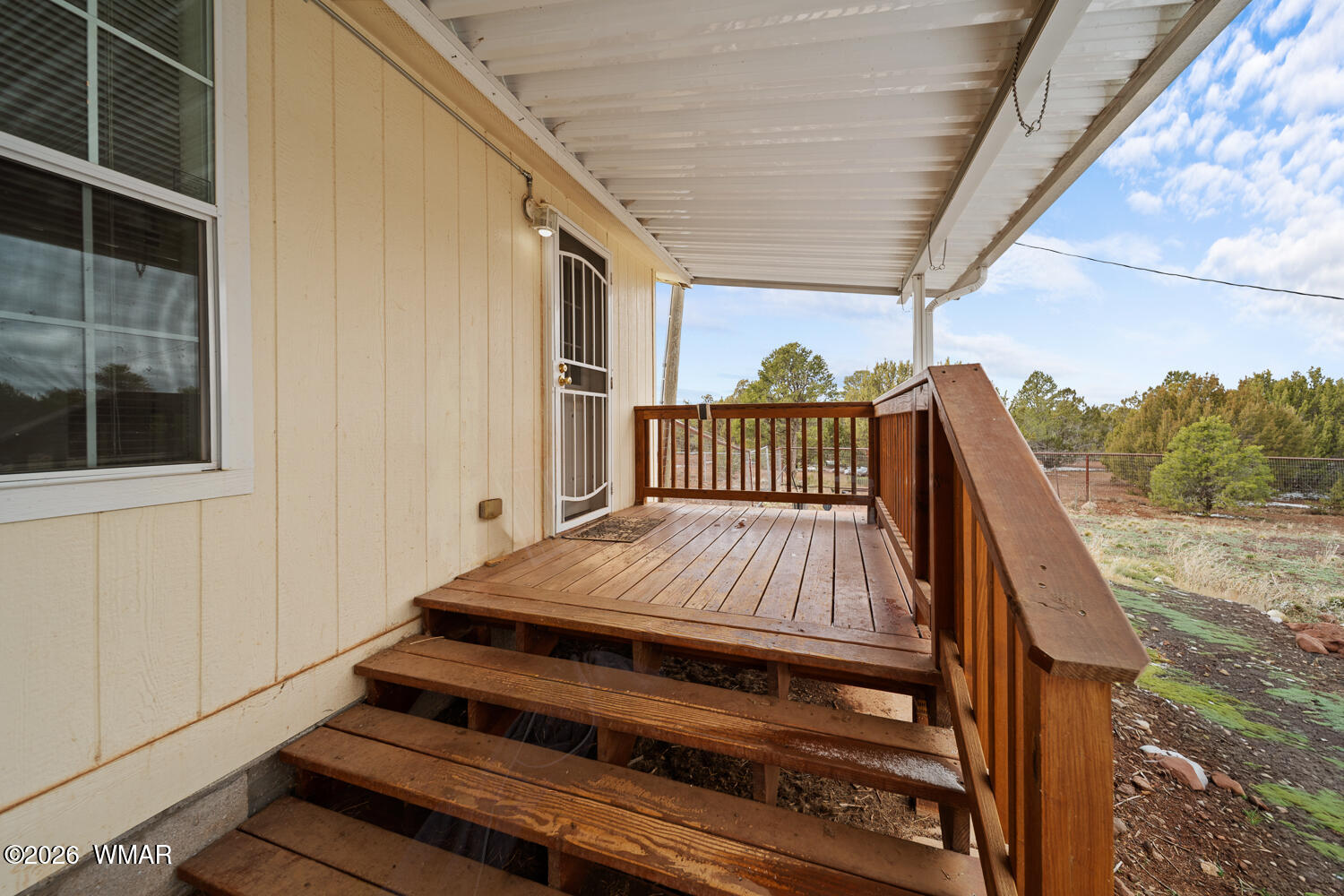9 N3307 Show Low, AZ 85901 - Photo 18 of 50 a view of balcony with wooden floor and fence