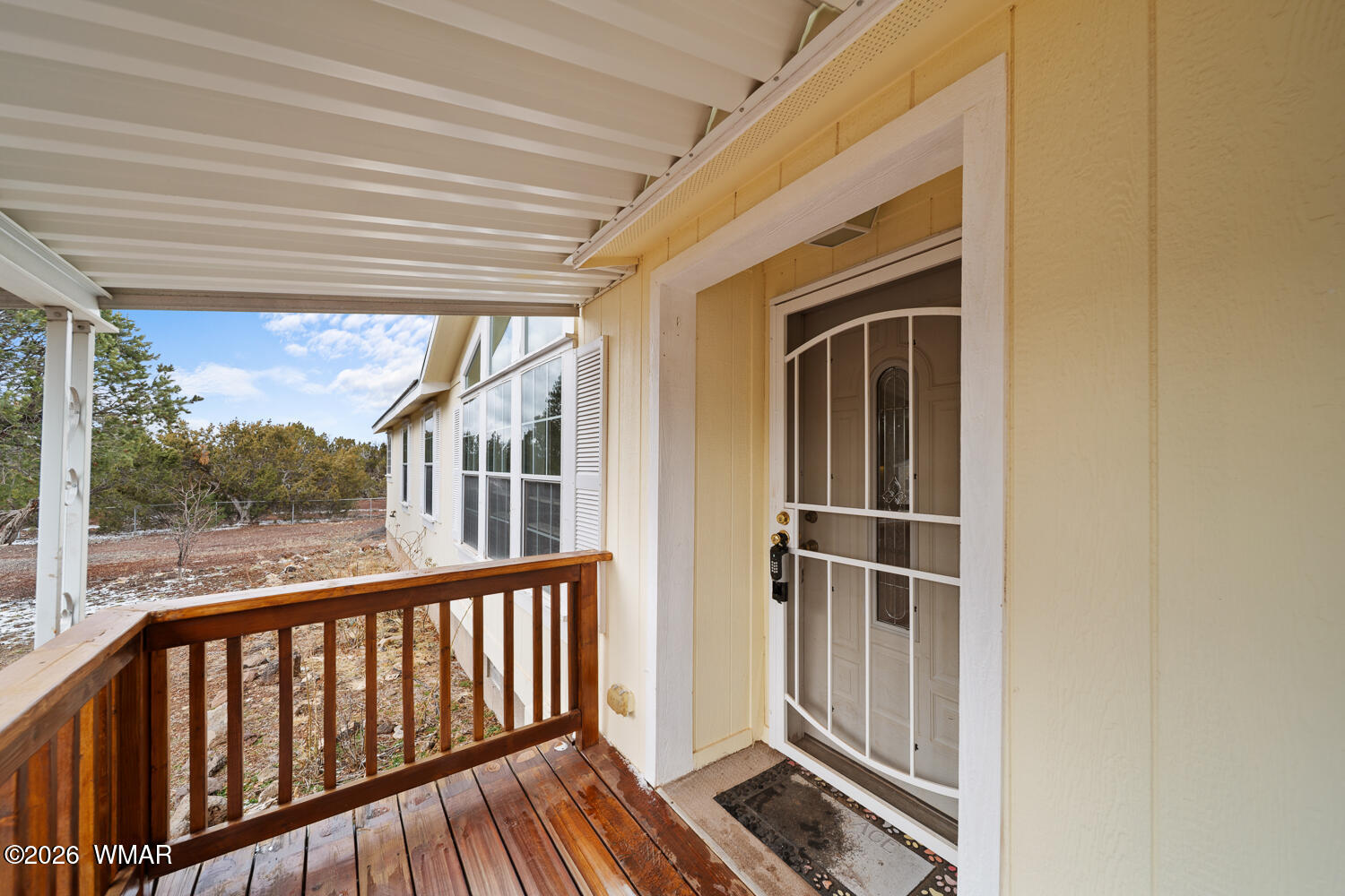 9 N3307 Show Low, AZ 85901 - Photo 20 of 50 a view of balcony with wooden floor and fence