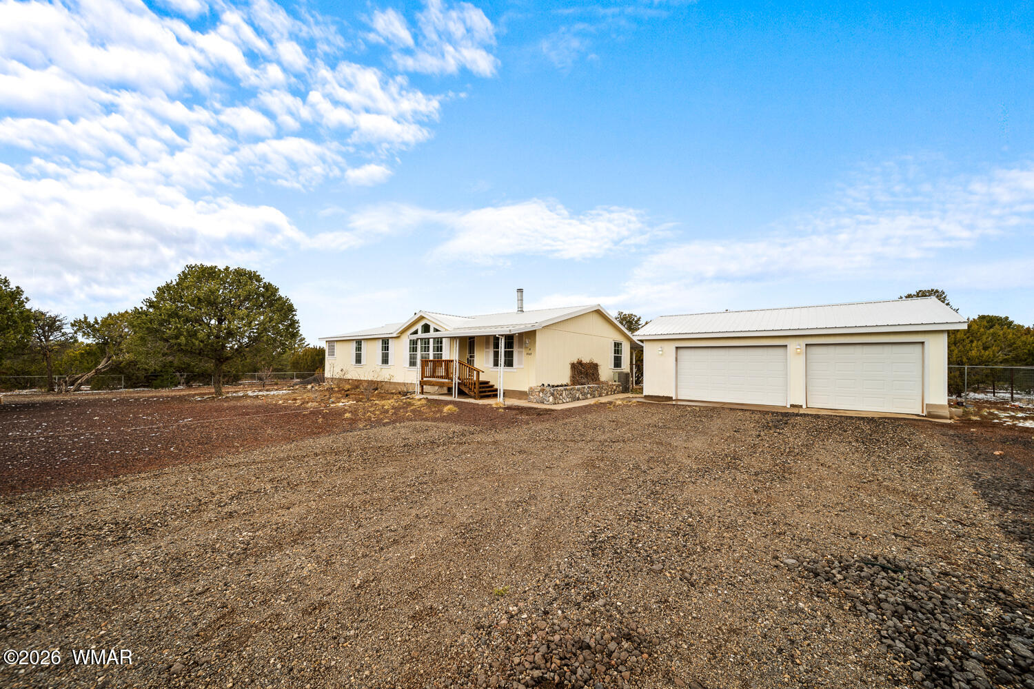 9 N3307 Show Low, AZ 85901 - Photo 2 of 50 a big house with a big yard and large trees