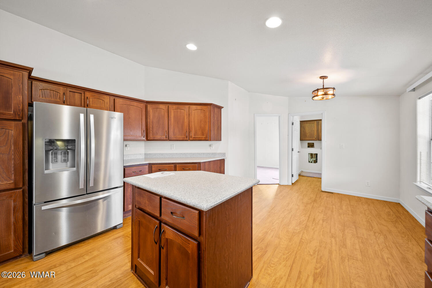 9 N3307 Show Low, AZ 85901 - Photo 31 of 50 a kitchen with a refrigerator and a sink