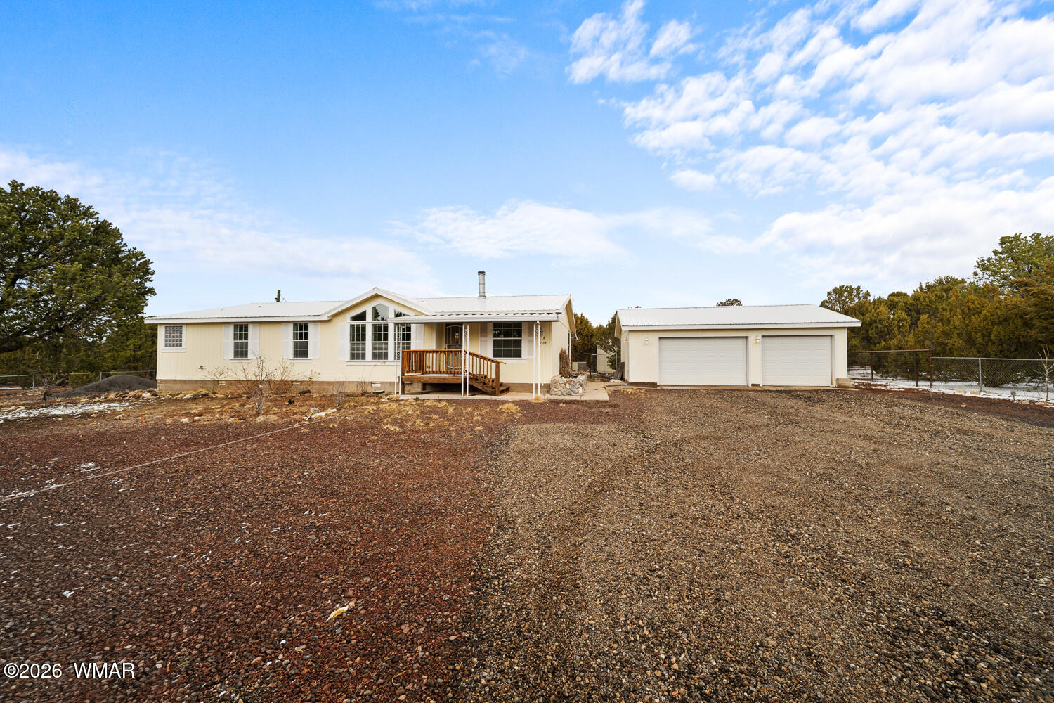 9 N3307 Show Low, AZ 85901 - Photo 4 of 50 a front view of a house with a yard
