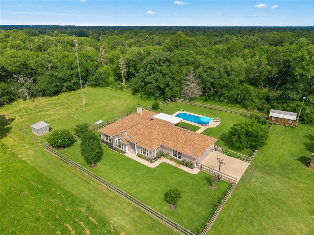 Aerial view of home from the front yard.