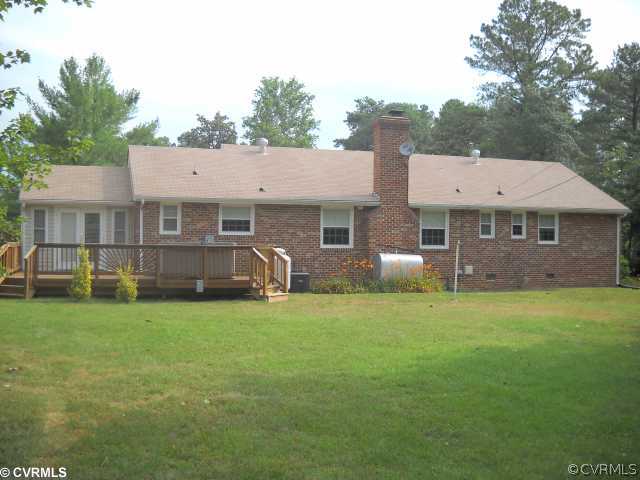 10461 Gotham Road Richmond, VA 23235 - Photo 10 of 12 Exterior Back - View from out by detached storage