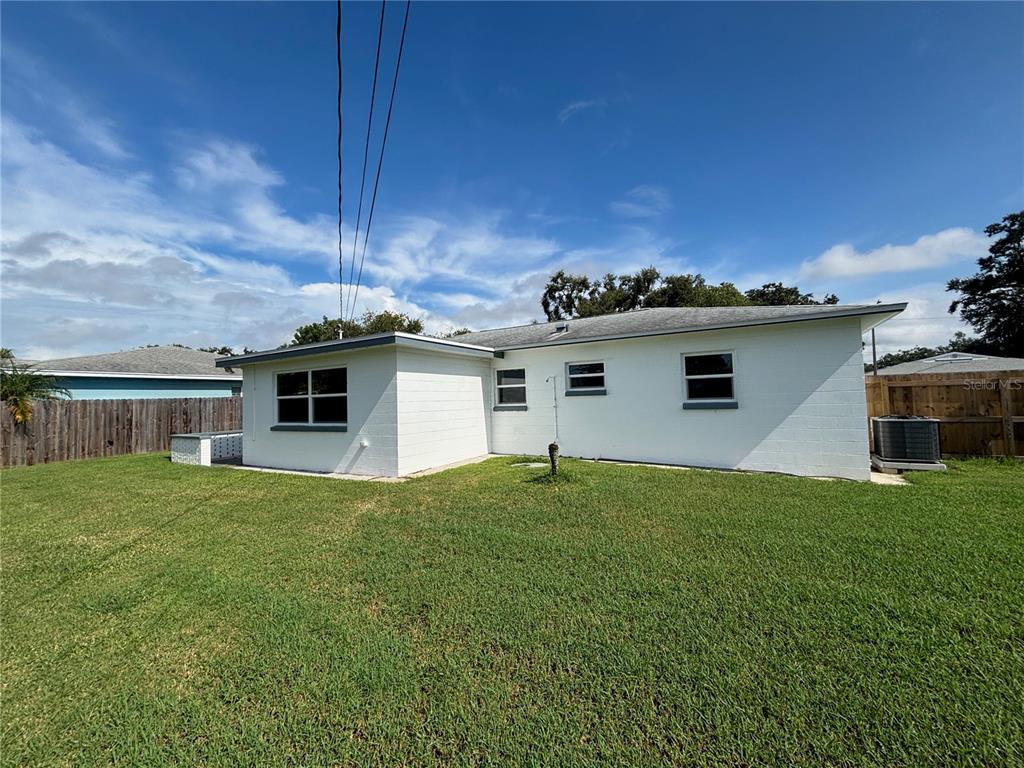 9950 52nd Terrace North St. Petersburg, FL 33708 - Photo 21 of 23 a view of a house with a yard