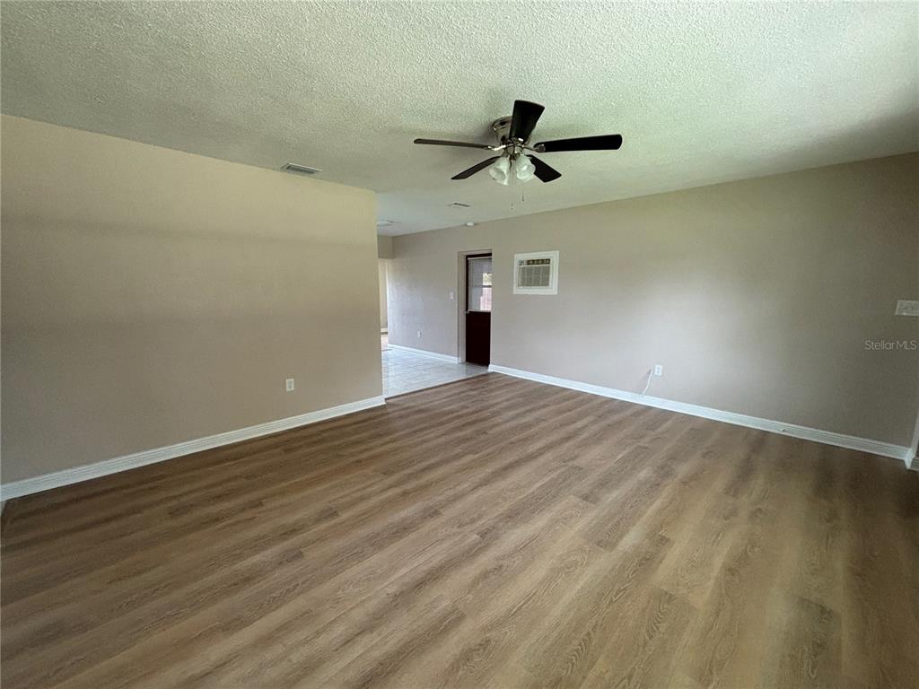 9950 52nd Terrace North St. Petersburg, FL 33708 - Photo 8 of 23 wooden floor in an empty room