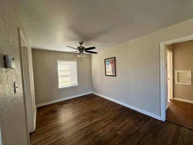a bathroom with a sink toilet a mirror and shower