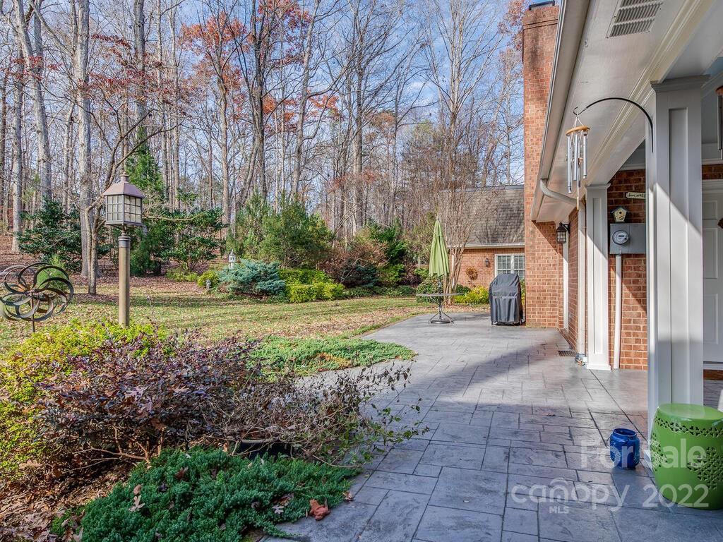 3039 High Ridge Road Charlotte, NC 28270 - Photo 23 of 26 a view of a garden from a building