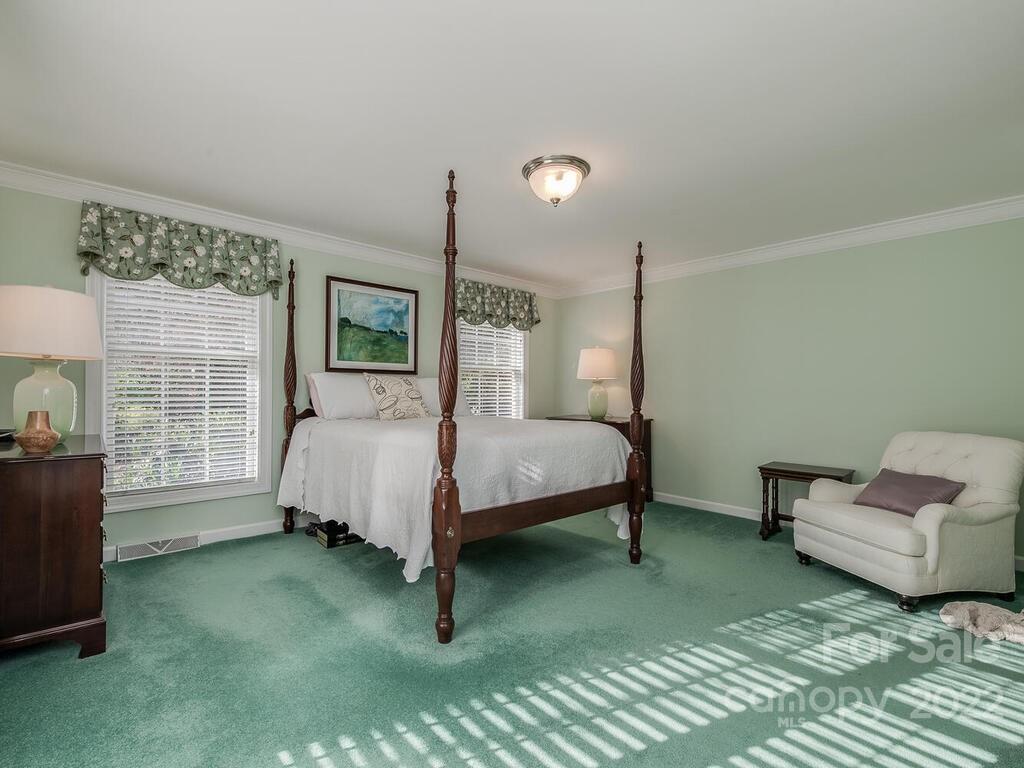 3039 High Ridge Road Charlotte, NC 28270 - Photo 8 of 26 a bedroom with a bed chair and window