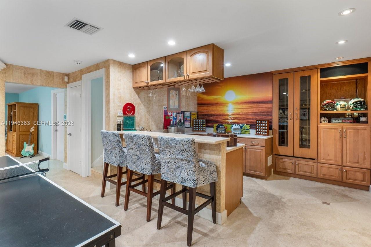 102 Xanadu Place Jupiter, FL 33477 - Photo 29 of 36 a view of a dining room with furniture